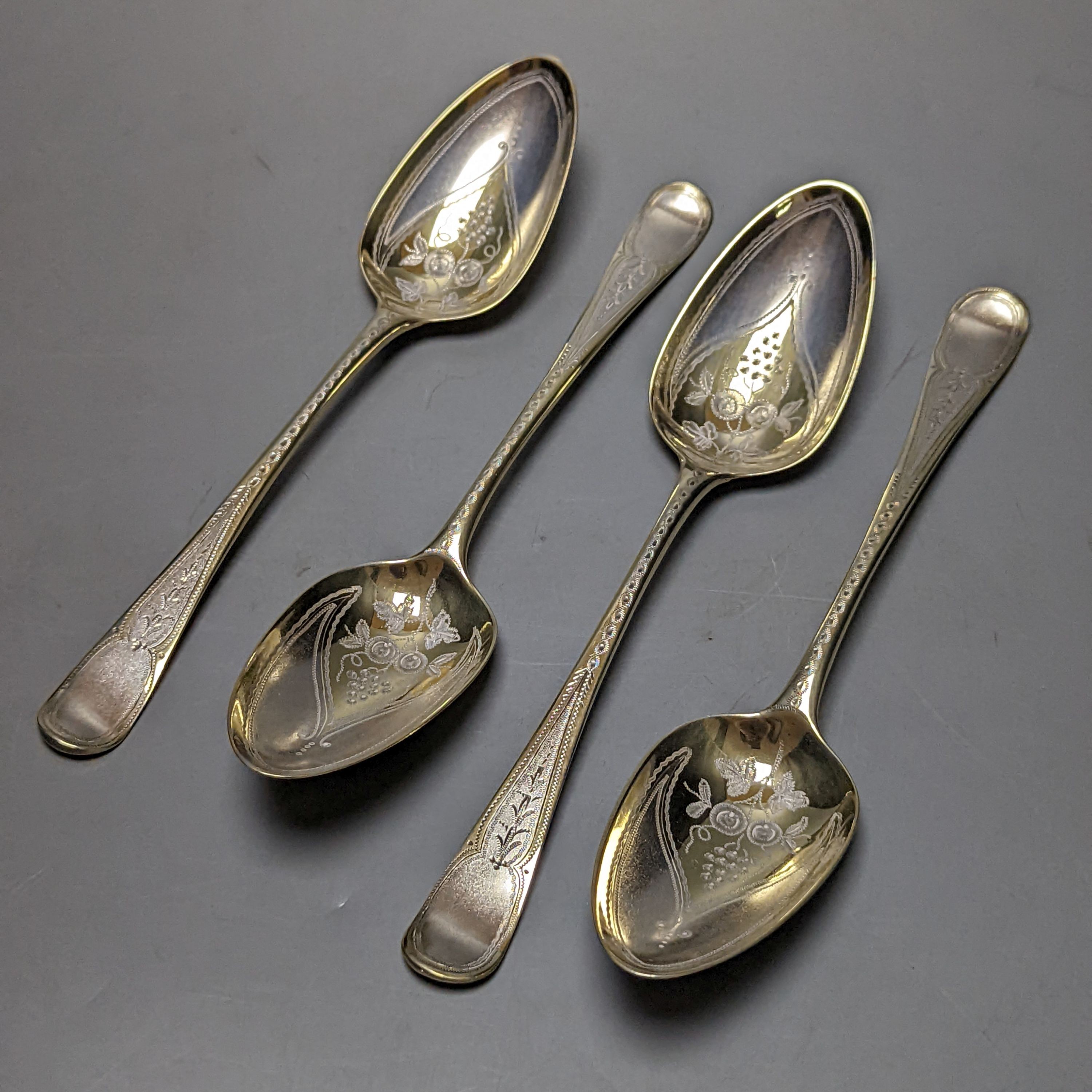 A set of 4 George III parcel gilt silver spoons, with engraved decoration, Thomas Northcote, London, 1796, 21.2cm